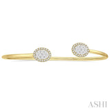 5/8 ctw Oval Shape Lovebright Open Cuff Diamond Bangle in 14K Yellow and White Gold