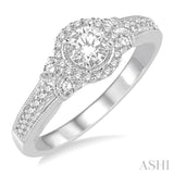1/2 ctw Diamond Engagement Ring with 1/5 ct Round Cut Center Stone in 14K White Gold