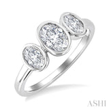 1 Ctw 3-Stone Bezel Set Oval Cut Diamond Ring in 14K White Gold