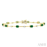 4x3 MM Oval Cut Emerald and 1/3 Ctw Round Cut Diamond Precious Bar Bracelet in 10K Yellow Gold