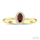 5x3 MM Oval Shape Garnet and 1/20 Ctw Round Cut Diamond Halo Semi-Precious Ring in 10K Yellow Gold