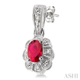 5x3 MM Oval Cut Ruby and 1/20 Ctw Round Cut Diamond Earrings in Sterling Silver