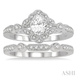 3/4 Ctw Round Cut Diamond Wedding Set With 5/8 Ctw Oval Cut Floral Engagement Ring and 1/10 Ctw Lattice Wedding Band in 14K White Gold