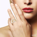 1/2 Ctw Curved Center Baguette Tower and Round Cut Diamond Insert Ring in 14K Yellow Gold