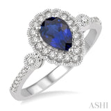 7X5MM Pear shape Sapphire Center and 1/4 Ctw Round Cut Diamond Precious Stone Ring in 14K White Gold