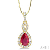 7x5 MM Pear Shape Ruby and 1/3 Ctw Diamond Pendant in 14K Yellow Gold with Chain