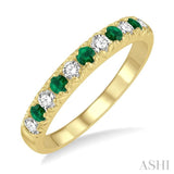 1/4 ctw Round Cut Diamond and 2.3MM Emerald Precious Wedding Band in 14K Yellow Gold