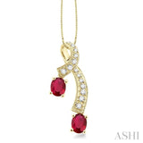 5x4MM Oval Cut Ruby and 1/6 Ctw Round Cut Diamond Pendant in 14K Yellow Gold with Chain