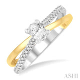 1/2 ctw Two Tone Criss Cross Round & Oval Cut Diamond Engagement Ring With 1/3 ctw Oval Cut Center Stone in 14K Yellow and White Gold
